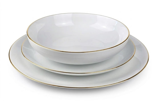Okrągły komplet obiadowy Base Gold z białej porcelany ze złotym rantem, 18 elementów.